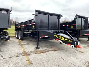 Dump Trailer 7x14 16,000 lb  Dump Trailer 7x14 16,000 lb. Heavy duty bumper pull design features dual jacks, a mounted spare tire, large chain storage box, and is 16,000 GVW rated. 